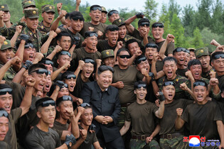 N.K. leader inspects sniper, special forces units at training base