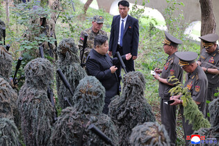 N.K. leader inspects sniper, special forces units at training base