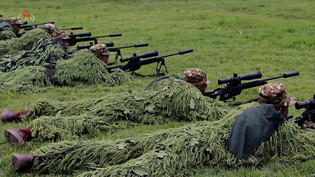 N.K. leader inspects sniper, special forces units at training base