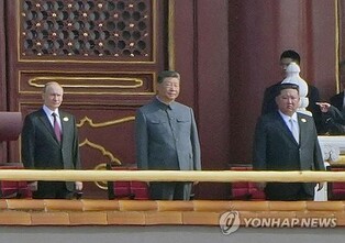 (4th LD) Kim joins Putin, Xi at military parade, in display of defiance against West
