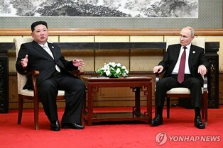 (2nd LD) Putin invites N. Korea's Kim to Russia as they meet in Beijing