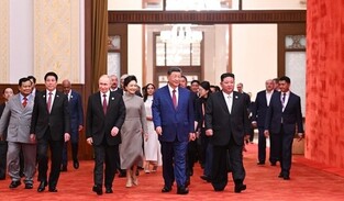 Kim joins lavish reception alongside Putin, Xi after military parade