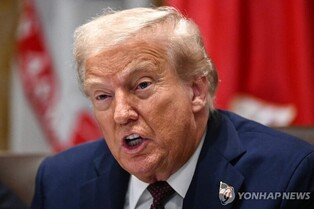 (LEAD) Trump inks executive order on Japan trade deal that lowers auto tariffs to 15 pct