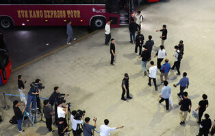 S. Korean workers return home after immigration detention in U.S.