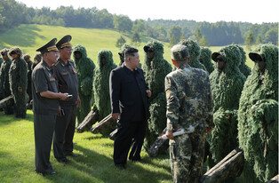 N.K. leader oversees shooting contest