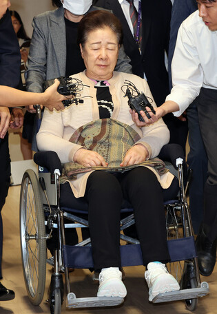 Unification Church leader grilled over alleged bribery