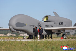 N.K. leader oversees performance test of tactical attack drones