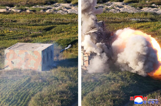 N.K. leader oversees performance test of tactical attack drones