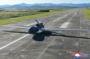 N.K. leader oversees performance test of tactical attack drones