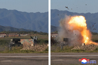 N.K. leader oversees performance test of tactical attack drones