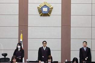 Yoon attends 1st hearing of new martial law trial