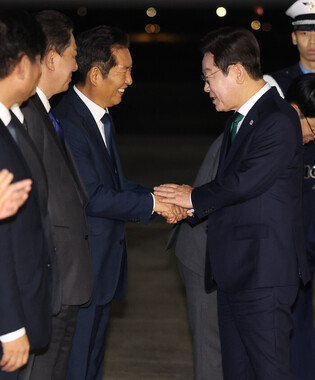 Lee returns home from New York