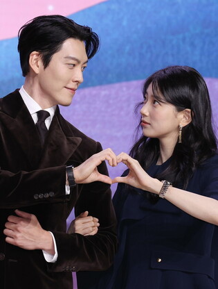 S. Korean actor Kim Woo-bin and actress Suzy
