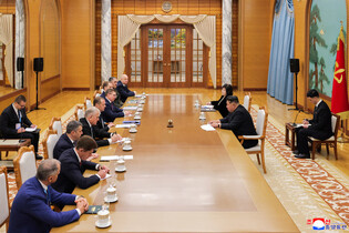 Kim meets Russian delegation