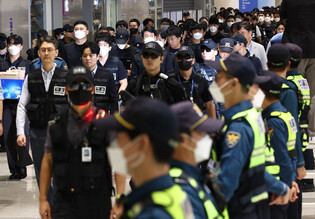 S. Koreans detained in Cambodia return home