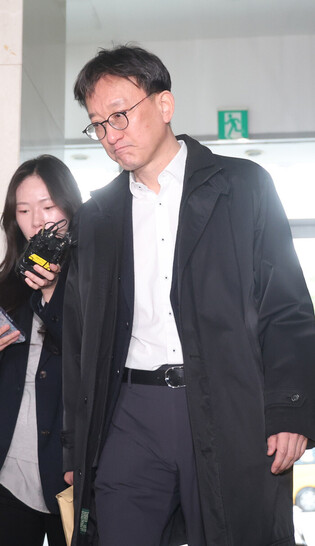 Ex-CIO prosecutor grilled over Marine's death