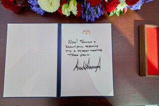 Trump signs guest book