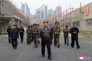 N.K. leader inspects factories under construction