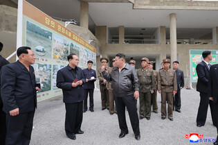 N.K. leader inspects factories under construction