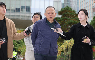 Power broker appears before special prosecutors