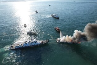 Shipping boat on fire