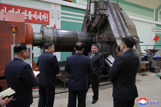 N.K. leader calls for expanding missile, shell production capacity