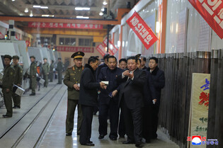 N.K. leader calls for expanding missile, shell production capacity