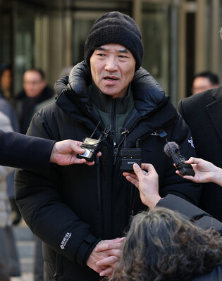 Ex-top officials acquitted over alleged cover-up of killing