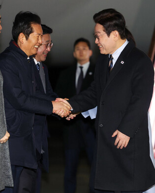 Lee returns home from China