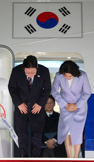 Lee returns home from China